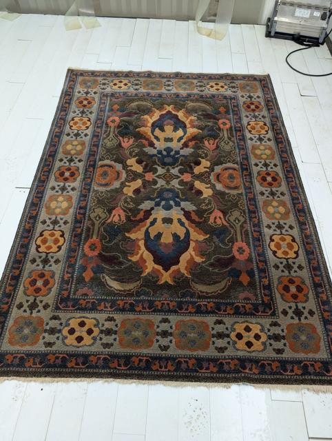 Arts and Crafts style area rug after cleaning