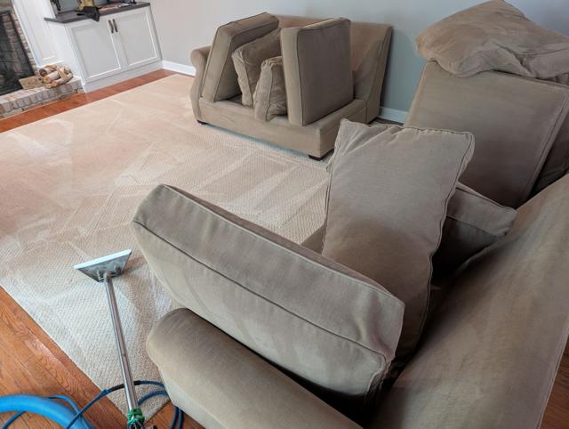 Carpet cleaning around a sectional with cushions set aside